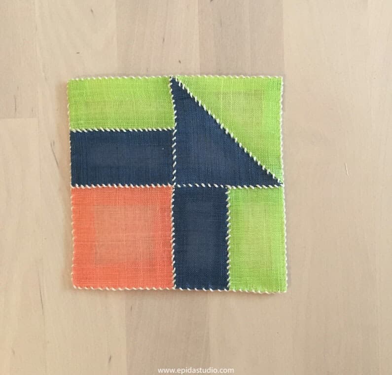 patchwork with orange, blue and green.