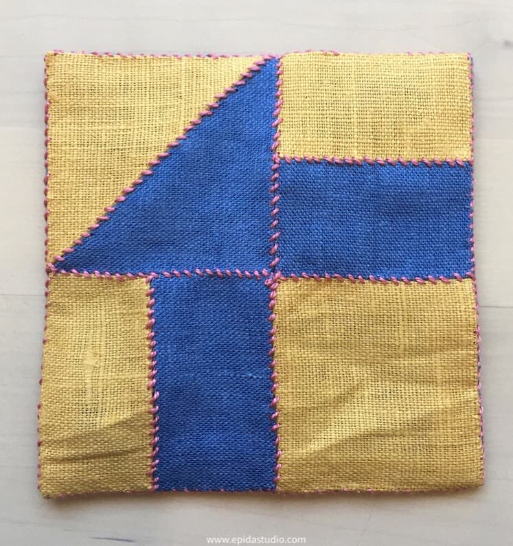 blue and yellow square coaster.