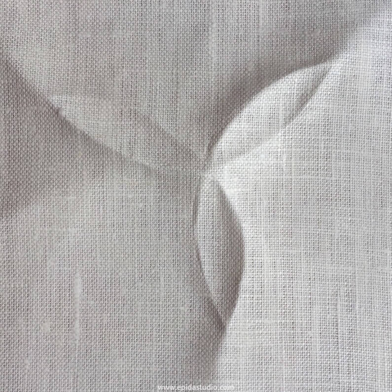 fabric with finger pressed design.