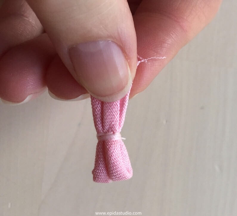 fabric rolls wrapped with thread