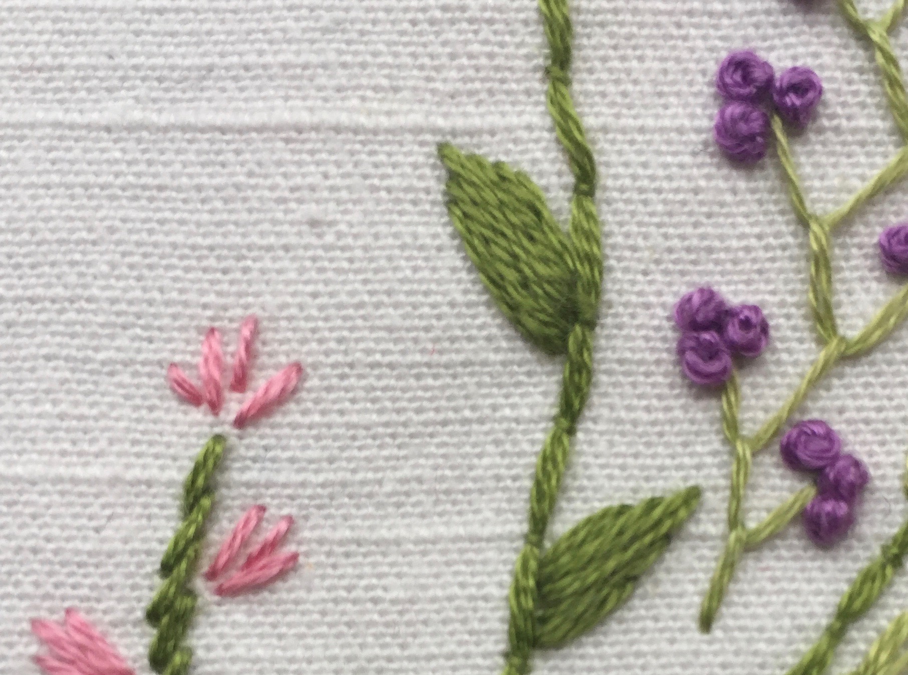 Satin stitch leaves in a freestyle embroidery project Satin stitch leaves in a freestyle embroidery project