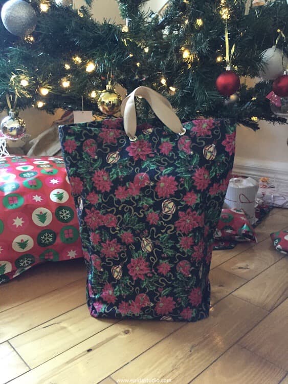 gift bag under a Christmas tree.