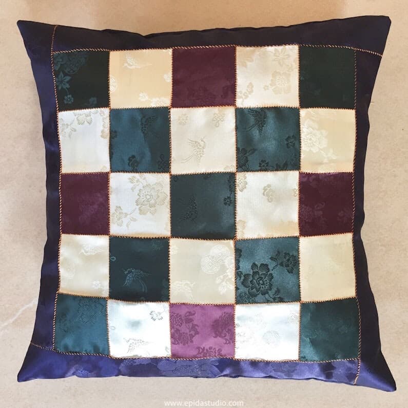 patchwork pillow made of 2" squares