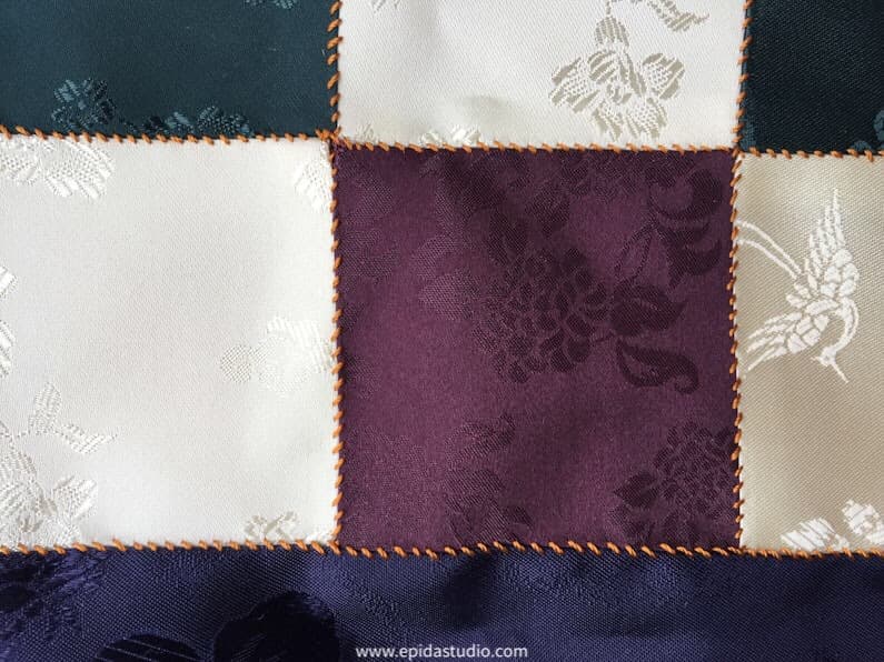 close up of patchwork stitching.