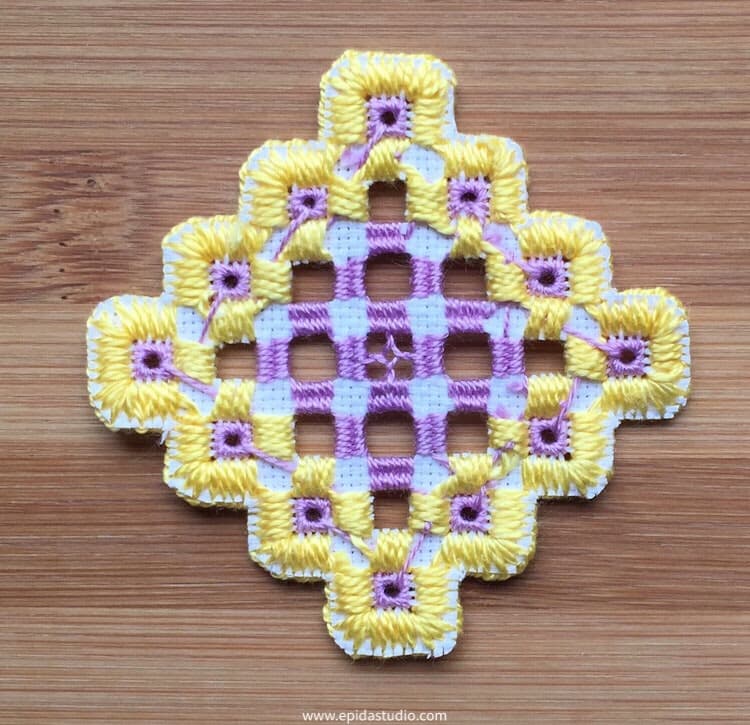 Reverse side of finished hardanger embroidery.