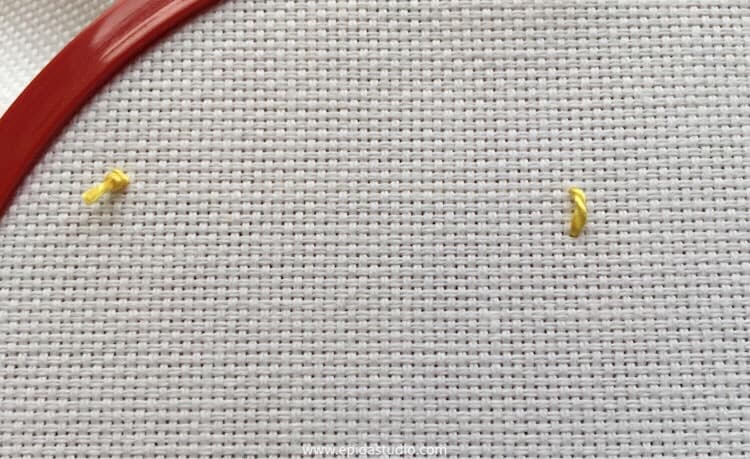 first stitch of kloster block with waste knot.