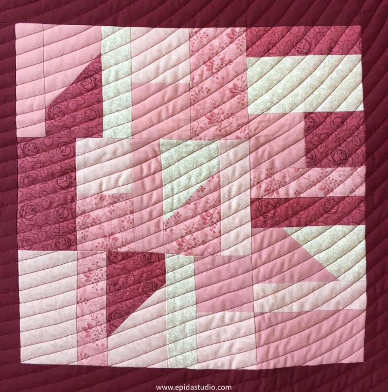 close up of pink Pojagi Inspiration quilt block.