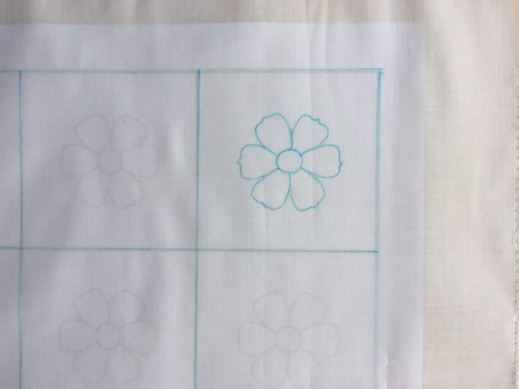 flower motif traced on fabric