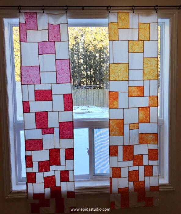 red and orange patchwork curtains