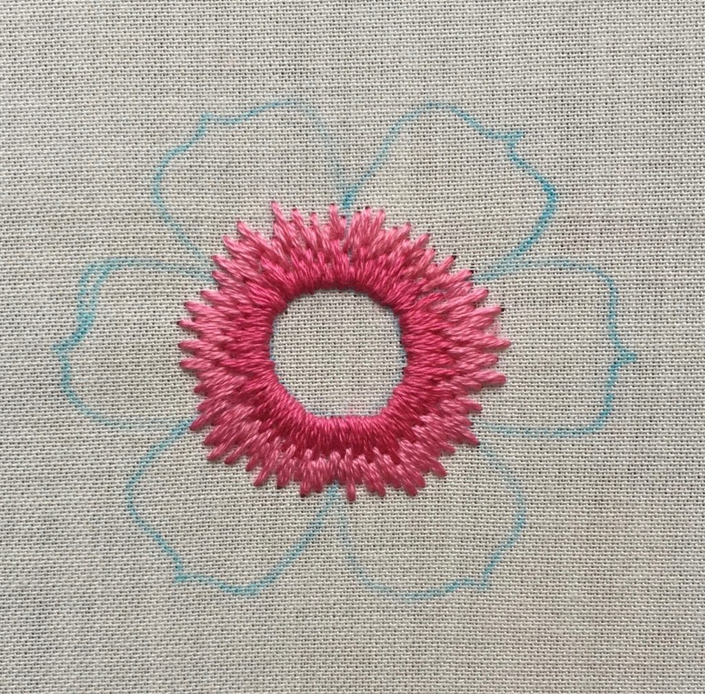 embroidery with pink floss