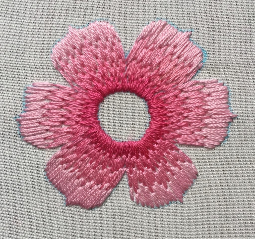 shades of pink embroidery floss in a flower