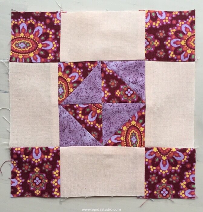 quilt block with triangles and squares
