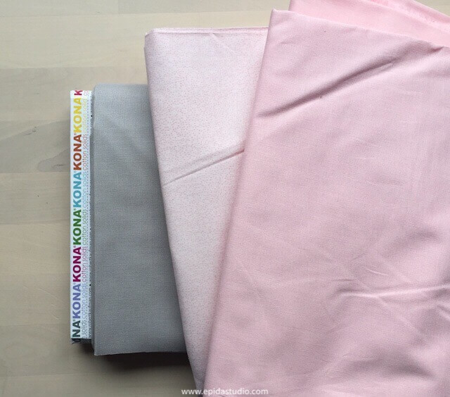 pink and gray fabric