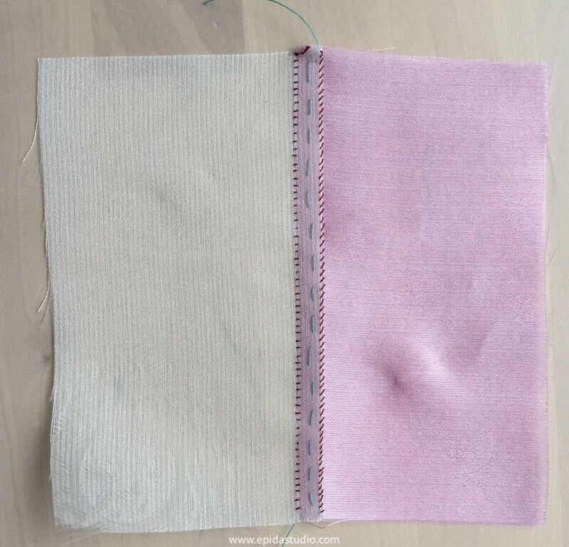 finished stitching with pink and white fabric