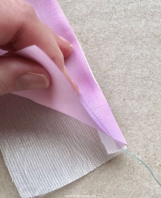 fabrics folded together for pojagi seam