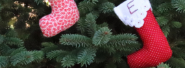 two stocking Christmas tree decorations with title "embroidered ornament pattern".