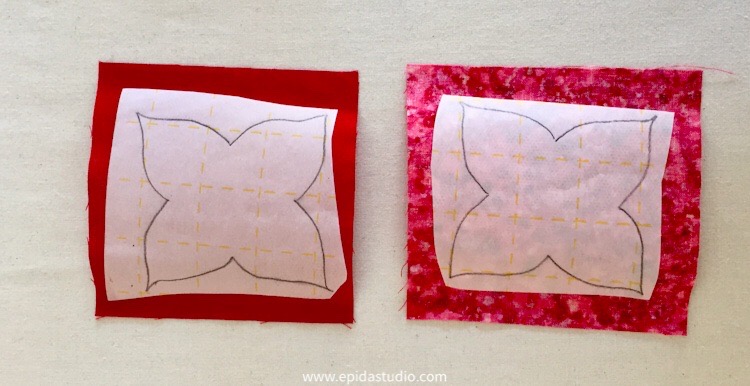 fusible web adhered to red fabric for applique.
