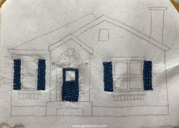 House with chain stitch embroidery