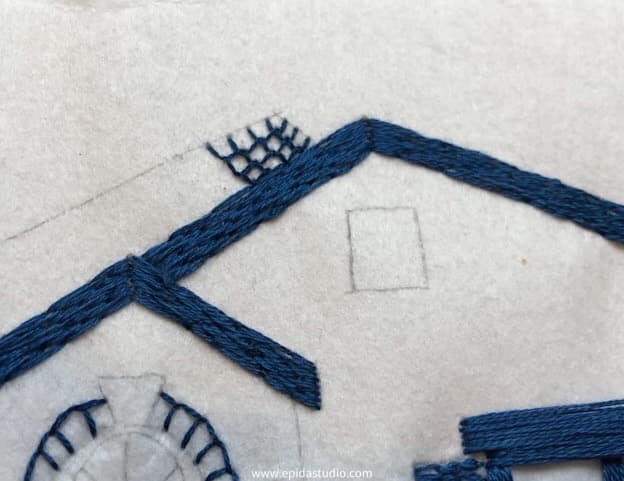featherstitch hand embroidery in progress.