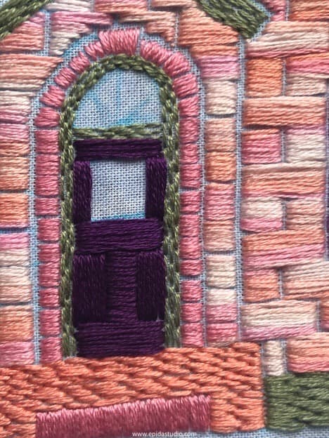 close up of door embroidered with satin stitch.