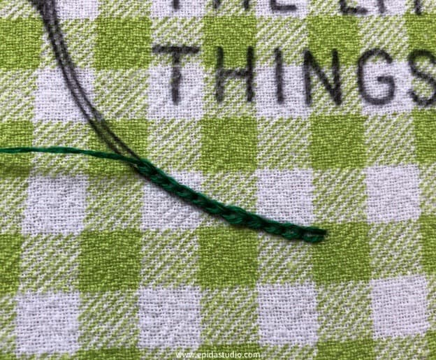 embroidering chain stitch.
