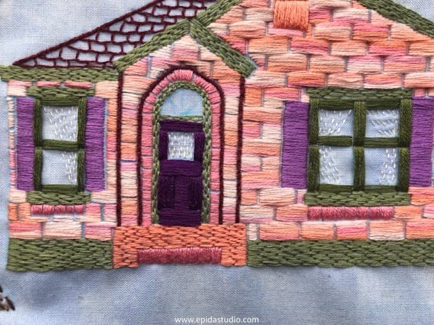 embroidered house.