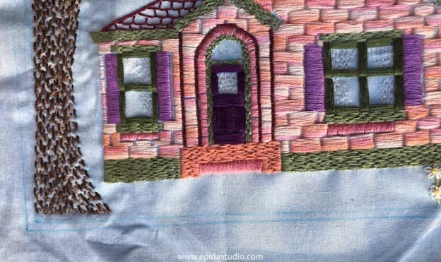 embroidered picture with lines marked for border.