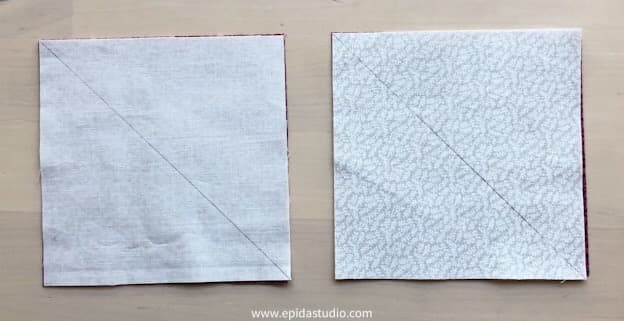 marking fabric squares for quarter square triangle.