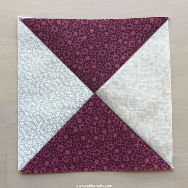 red and white quarter square triangle.