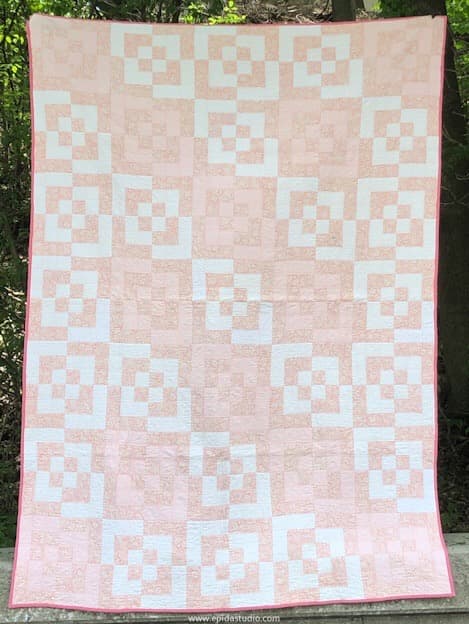 bento box quilt in peach and white.