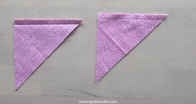 joining fabric triangles into pairs.