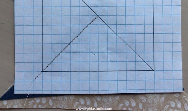 stitching seam on paper.