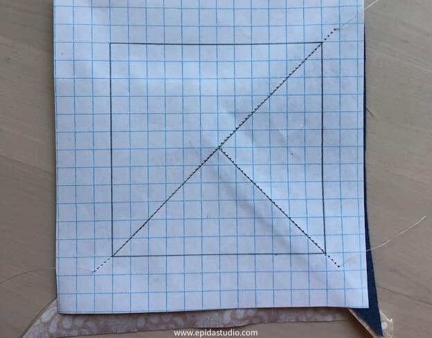 stitching second seam on paper.