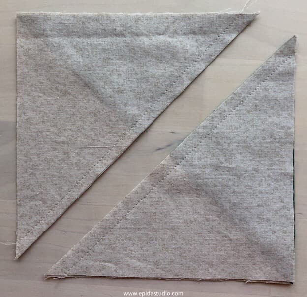 fabric square cut on the diagonal.
