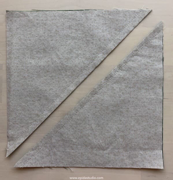 fabric square cut on diagonal.