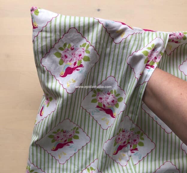 using a hera marker to poke out the corner of a pillow case when turning right side out,