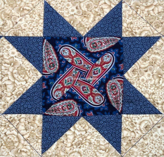 close up of star block pieced with stack and whack technique.